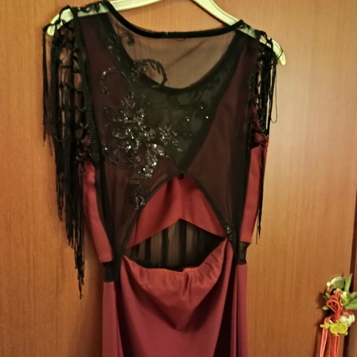 Midi dress for special occasions like new, burgundy with lace and fringes