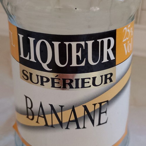 Vintage banana liqueur bottle used, empty for collection