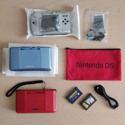 Nintendo DS (2004) console used with 2 games, charger, and accessories