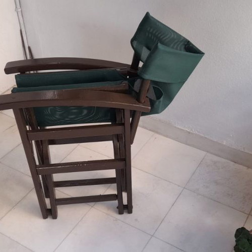 Outdoor lounge furniture used with 4 director chairs and metal table