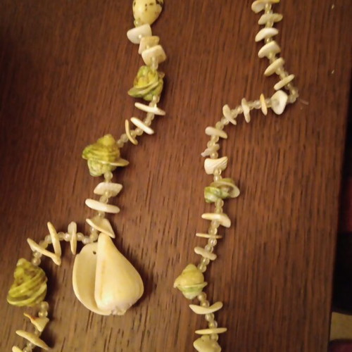 Long necklace made of shells like new, beige and brown