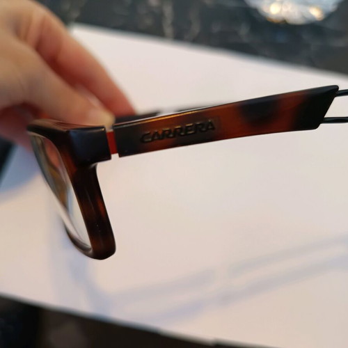Carrera eyeglass frame used, black with light brown