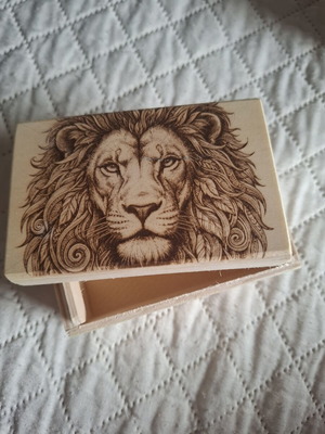 Wooden box with laser lion design