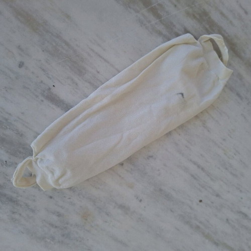White fabric face mask used with filter pocket