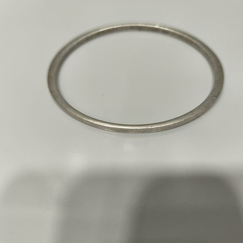 Brass bangle bracelet with matte silver finish