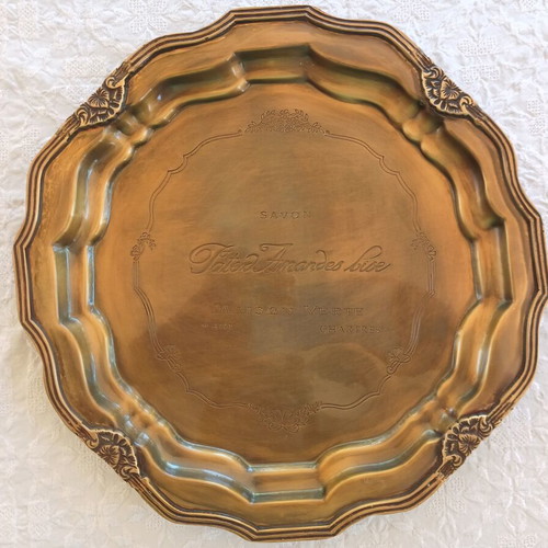 Bronze tray like new with engraved designs and curved finish