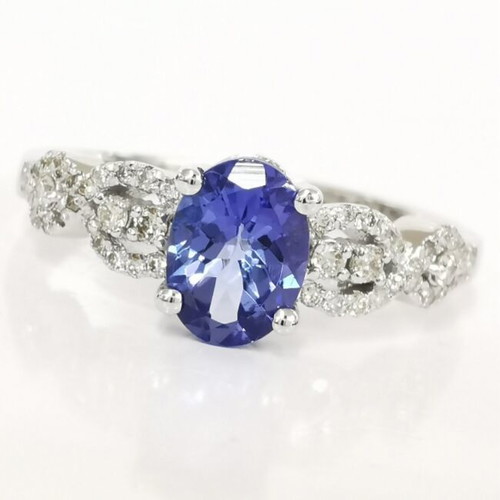 Tanzanite and diamond ring in 14 ct white gold, new