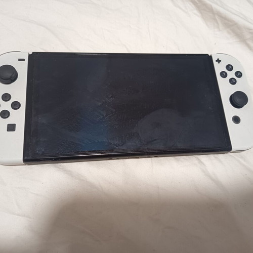 Nintendo Switch with three games