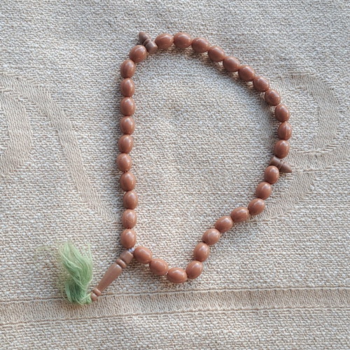Komboloi with 35 beads like new, plastic, green tassel