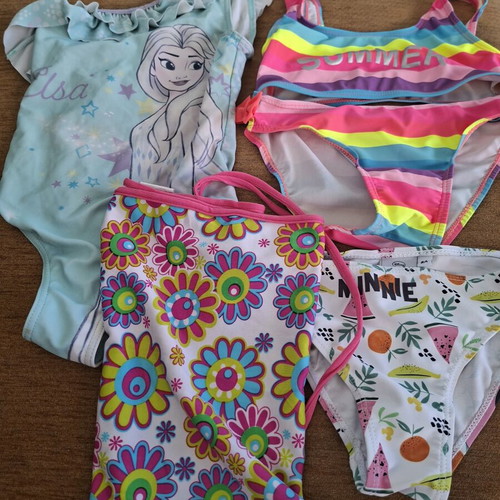 Girls' swimwear set like new, age 8, 3 swimsuits and 1 pareo
