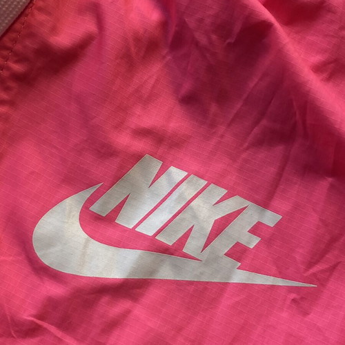 Nike Windrunner lightweight jacket pink and black, size S