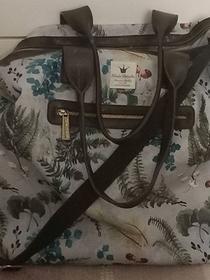 Elodie details diaper bag used for travel and stroller