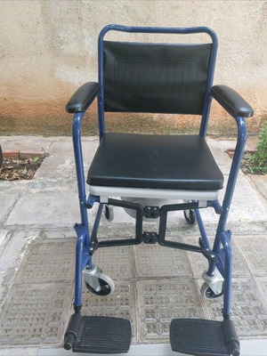 Commode wheelchair with metal frame, like new
