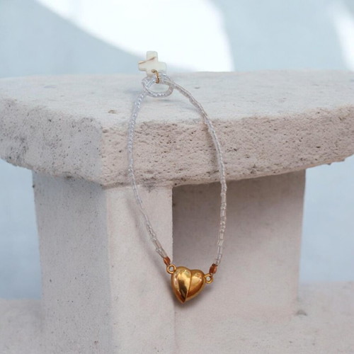 Handmade bracelet with white beads and gold magnetic heart clasp with cross pendant