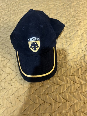 AEK Champions League hat used, adjustable, black and yellow
