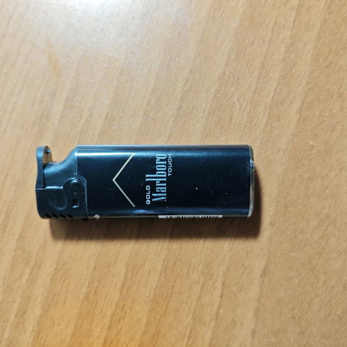 Marlboro collectible windproof lighter used, functional