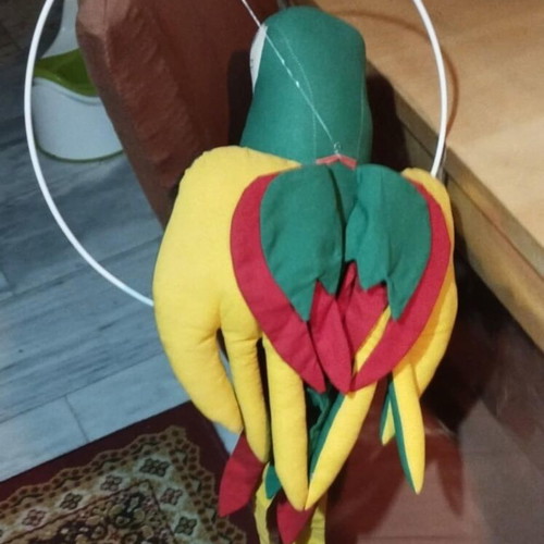 Large parrot doll used with metal hanging base