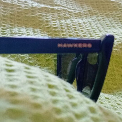 Hawkers women's sunglasses used, black with lens wear