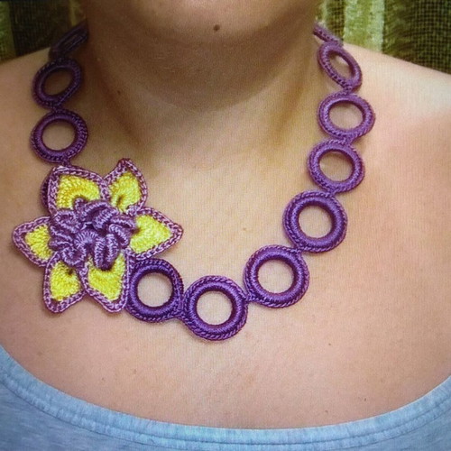 Handmade crochet necklace and earrings in purple with yellow daisy new