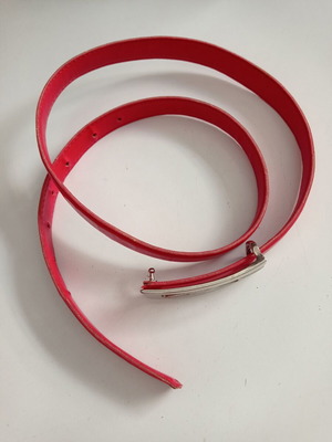 Women's thin red belt used
