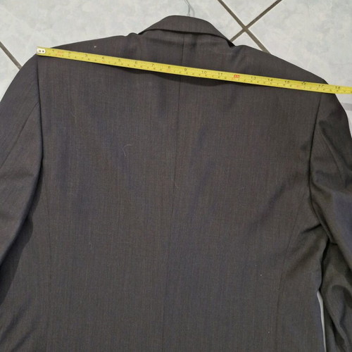 Louis Vuitton Uniformes brown suit, unworn