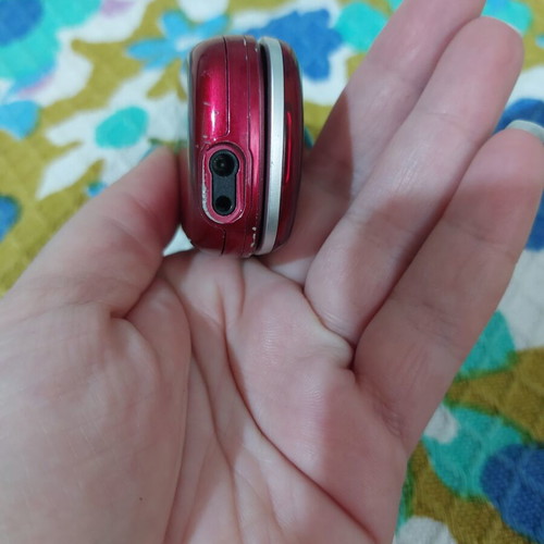 Alcatel vintage flip phone used, red, charger included