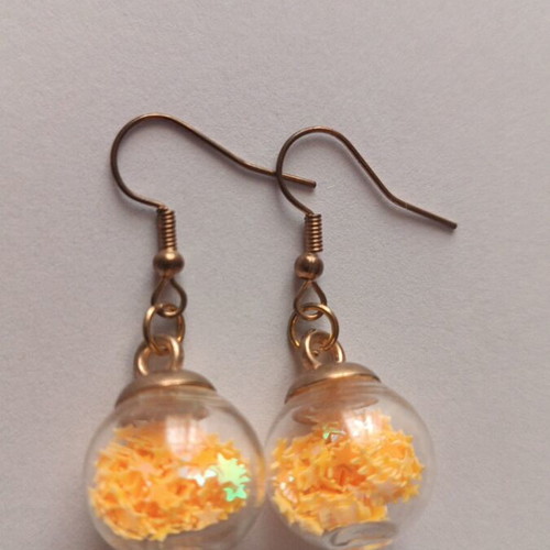 Earrings balls with orange stars new, gold-colored