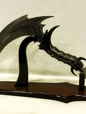 Decorative stainless steel knife with stand like new