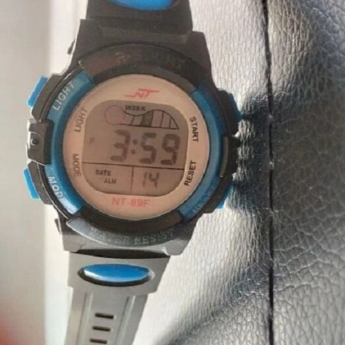 Children's multi function electronic watch like new, black and blue