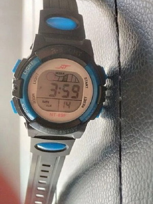 Children's multi function electronic watch like new, black and blue