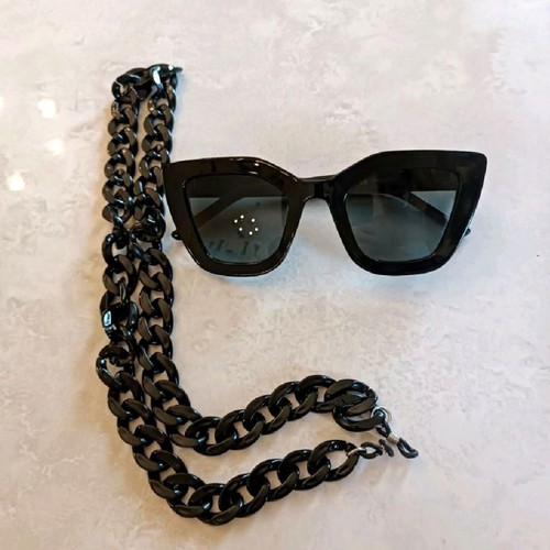 Meller sunglasses with polarized lens and chain, never worn