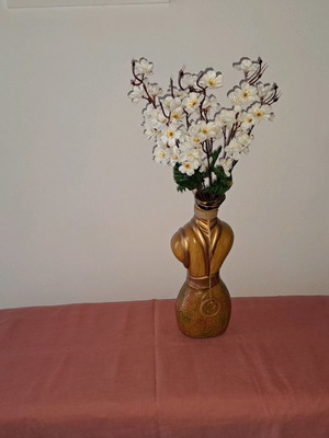 Decorative vase with bouquet and vase with artificial flower used