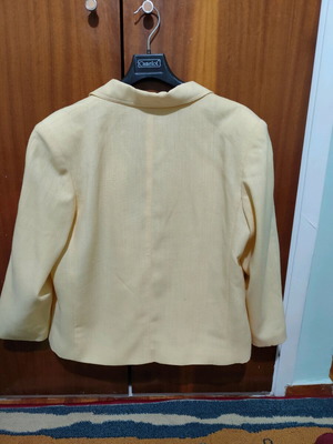 Light yellow linen jacket used, size large
