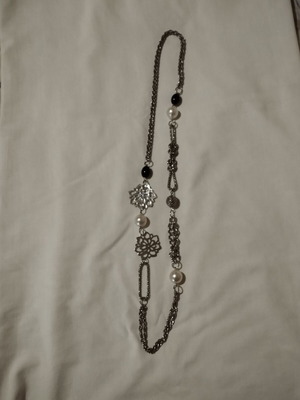 Necklace with metal elements in silver color like new