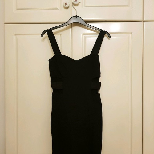 Mini black dress like new, elastic, size 36