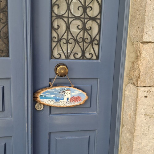 Handmade wooden wall decor with Cycladic art style