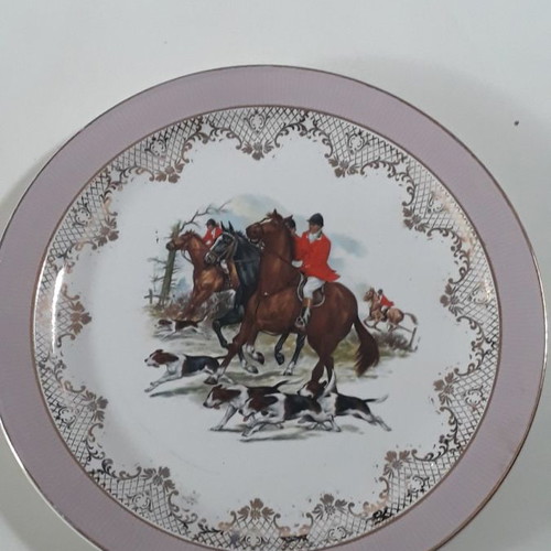 Porcelain plates used, two English with pink border
