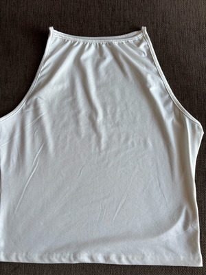White sleeveless shirt size L like new