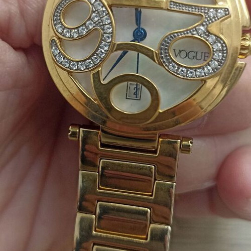 Vogue wristwatch like new, gold stainless steel with decorative stones