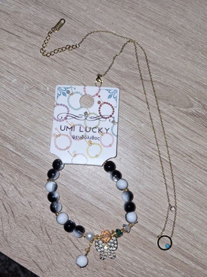 Jewelry set new, bracelet and necklace black and gold