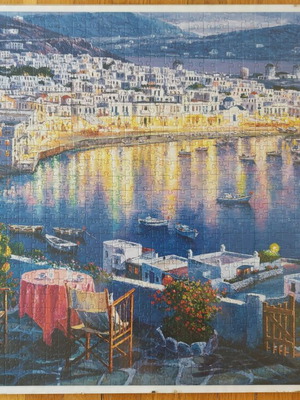 Framed puzzle like new, dimensions 0.50x0.70