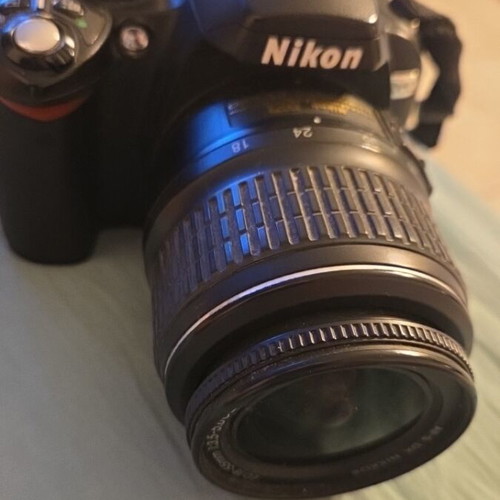 Nikon DSLR model D60 camera used with Nikon Aspherical lens