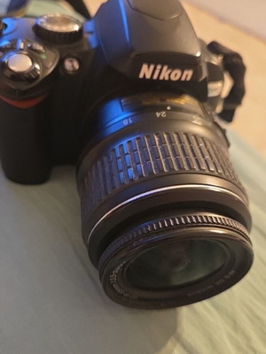 Nikon DSLR model D60 camera used with Nikon Aspherical lens