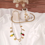 Handmade gold steel necklace with natural pearl, fruit and sea charms