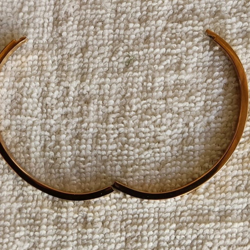 Gold plated stainless steel bangle in rose gold like new, hinged