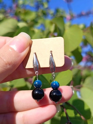 Handmade earrings new with steel hooks and black and blue beads