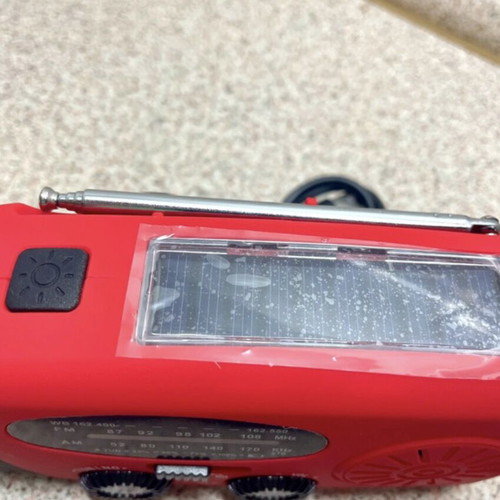 Multifunctional Emergency Gadget with FM Radio, Powerbank, Solar and Hand Charging, Flashlight
