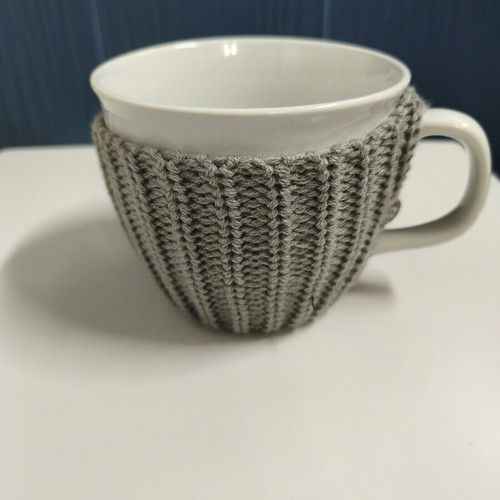 Butlers mug with knitted cover, like new, white and grey