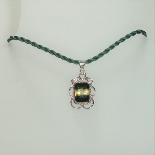 Platinum plated pendant with crystal new on silk cord