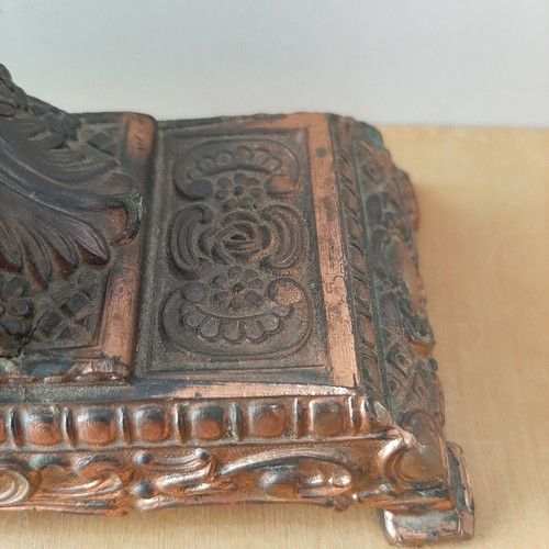 Copper German wind-up clock used with cathedral motif